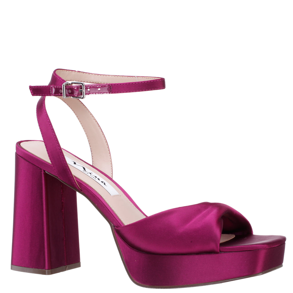 Premium Photo | A high heel electric purple flowers sandal generative AI
